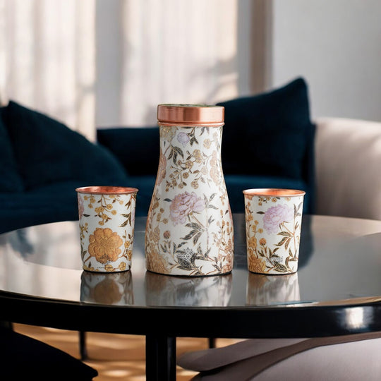 Golden floral design copper bottle and tumbler set by Indian Art Villa, ideal for festive décor and premium gifts.