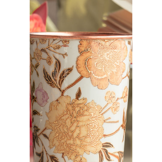 Golden flower artwork is perfectly printed on the copper glasswear carefully crafted by Indian Art Villa