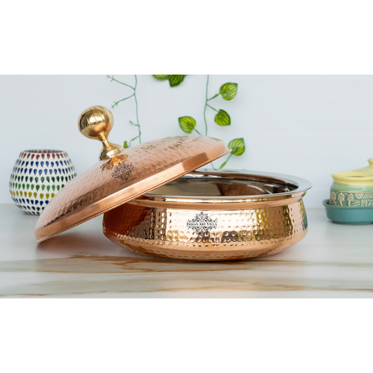 The soul of tradition lives in copper handi 1400ML Indian Art Villa hammered copper lid crowned with luminous brass knob
