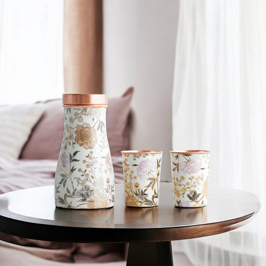 Golden floral design copper bottle and tumbler set by Indian Art Villa, ideal for festive décor and premium gifts.