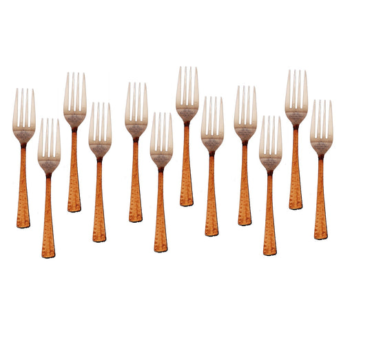 Set of  steel copper forks with hammered design offering a luxurious addition to any dining occasion or meal.