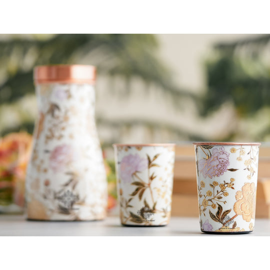 Golden floral design copper bottle and tumbler set by Indian Art Villa, ideal for festive décor and premium gifts.