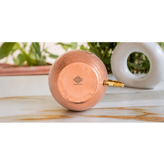 Copper barware mug with glossy finish and artisanal hammer marks
