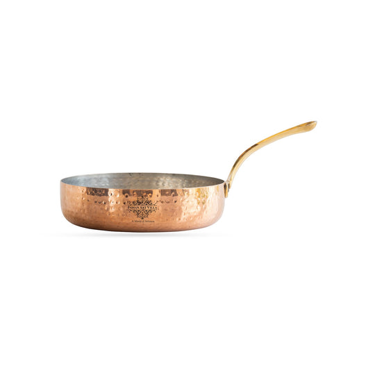 Handcrafted copper round pan with tin lining and brass handle perfect for those who appreciate fine cooking tools