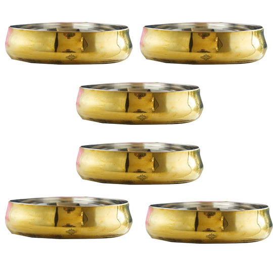 Steel brass halwa plate set with elegant curved silhouette mirror polished surface and artisan golden outer ring design