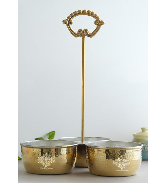 Decorative pital vegetable serving bowl with double hammered compartments and artistic central lifting handle