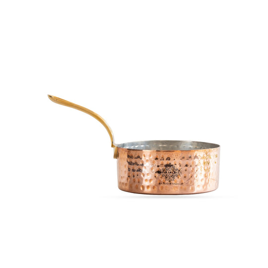 Premium copper cookware with an elegant hammered design and brass handle for superior performance.
