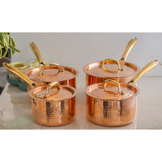 Traditional kitchen cookware set in hammered copper with lid and long handles beautifully crafted by IAV

