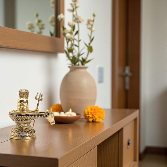 Brass Shivling with Nandi Face & Trishul – Decorative Spiritual Idol