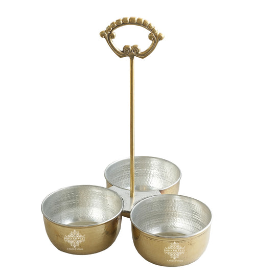 Handcrafted brass vegetable serving bowl with hammered design silver coating inside and vertical brass grip handle