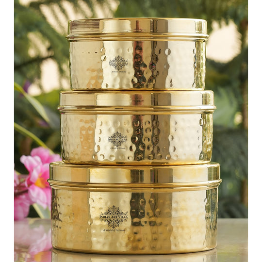 Brass container set with radiant hammered design artisan made in polished gold tone with graceful rounded form