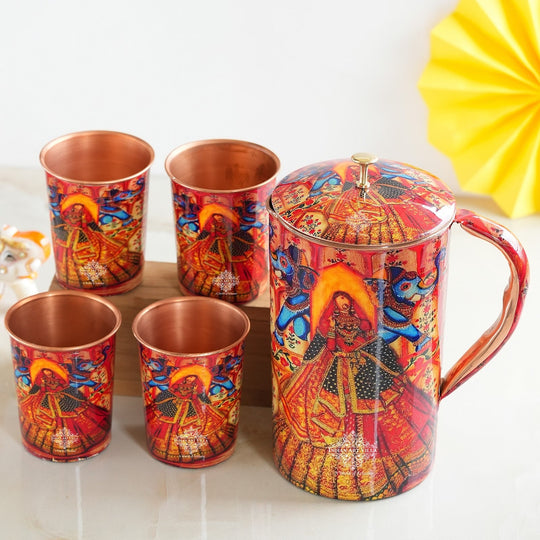 Ayurvedic Copper Jug & 2 Glass Set by Indian Art Villa, featuring Rajasthani Meena 'Padharo Mhare Desh' print, ideal for home decor.