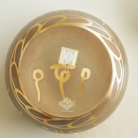 Indian Art Villa brass singing bowl with golden mantra design and cushion, ideal for meditation, sound therapy, and gifting.