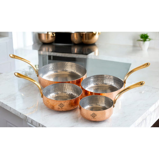 Indian Art Villa handcrafted copper round pan with brass handle and tin lining creates an exquisite addition to any kitchen.