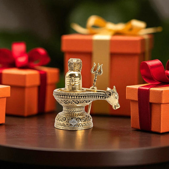 Brass Shivling with Nandi Face & Trishul – Decorative Spiritual Idol