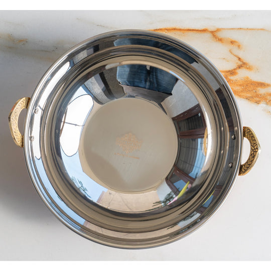 Top view of steel copper hammered kadhai with brass handles