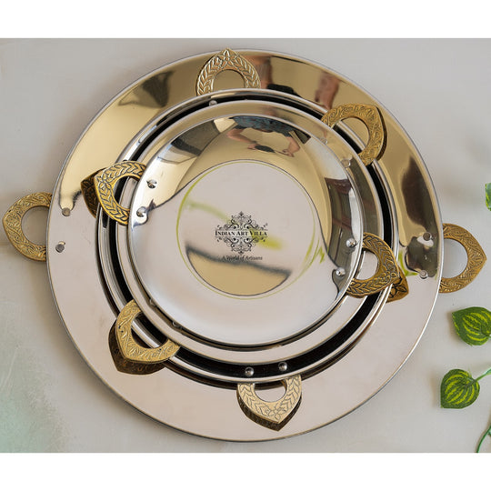 Indian Art Villa’s durable hammered steel copper serving platter with intricately designed brass handles.
