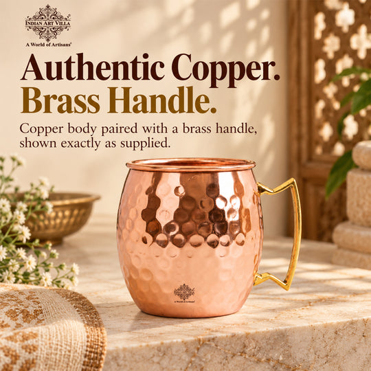 Copper Moscow Mule serving cup with a glossy hammered exterior