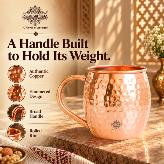Round copper drinkware mug with handcrafted hammered surface