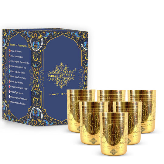 Crafted pure brass glass with embossed flower design adds a touch of tradition and beauty to your collection or as a gift