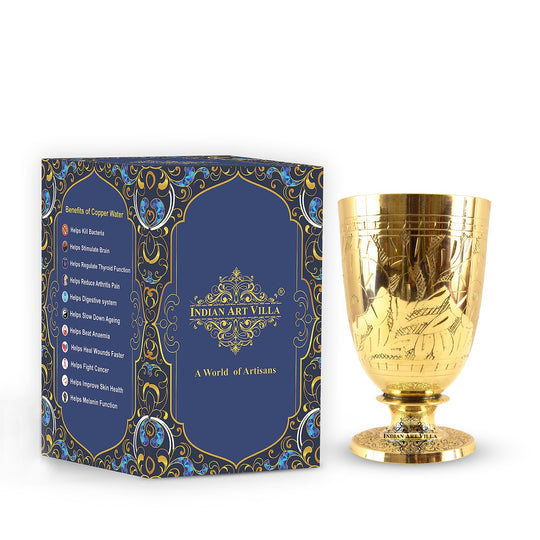 Traditional brass glass with leaf embossed detailing designed for temple rituals pooja rooms or festive gifting
