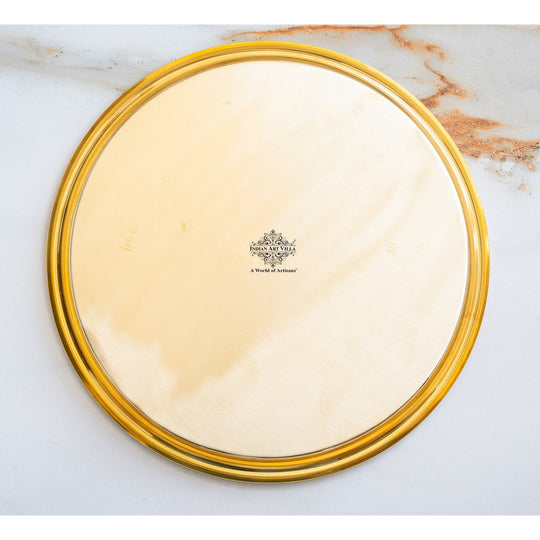 Round brass thali in mirror polish crafted by Indian Art Villa featuring clean flat plate area and gently lifted border