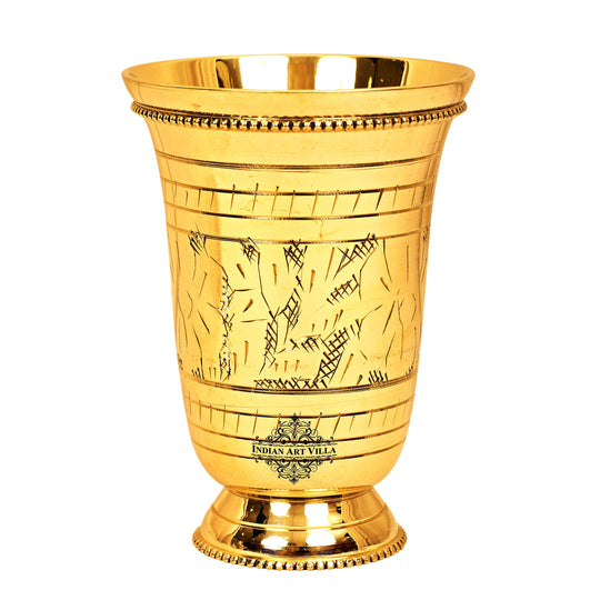 Premium brass glass with beautiful embossed patterns and a beaded rim, an elegant addition to your dining collection.