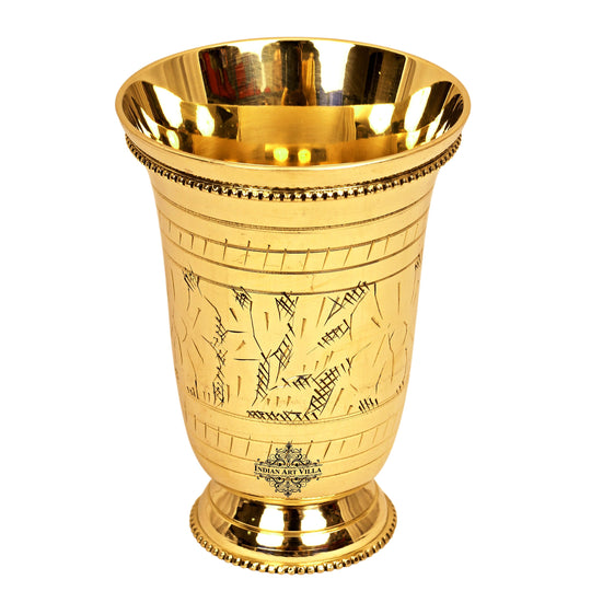 Brass glass with an embossed design and beaded rim a perfect addition to your traditional home decor collection.
