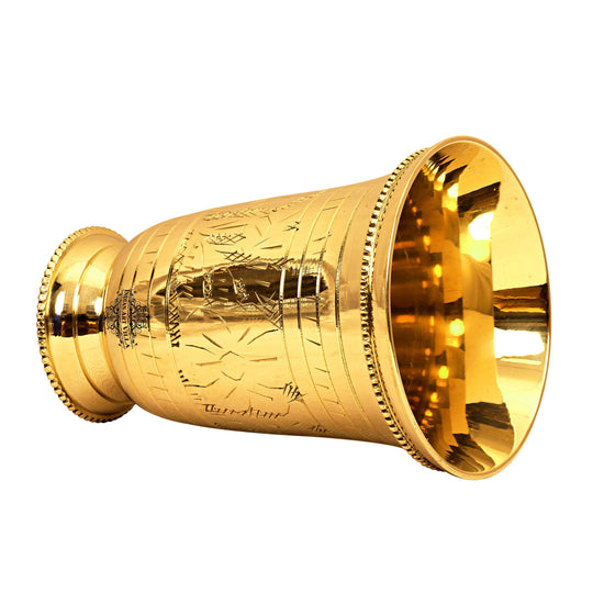 Elegant brass glass with a decorative beaded rim and embossed design makes an ideal centerpiece for your home.