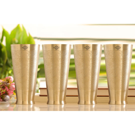 Intricately designed brass glass with a 400ml capacity and floral embossing for serving your favorite drinks.