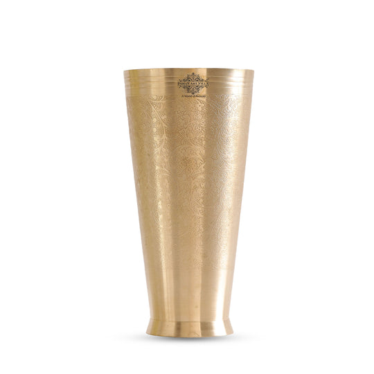 Beautifully embossed brass lassi Tumbler with floral design perfect for enjoying lassi or other beverages.