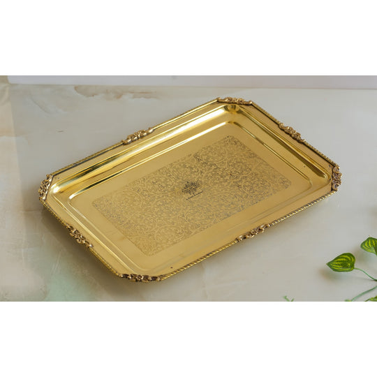 Decorative brass platter with golden finish perfect for festive dining table centerpieces or elegant food presentation