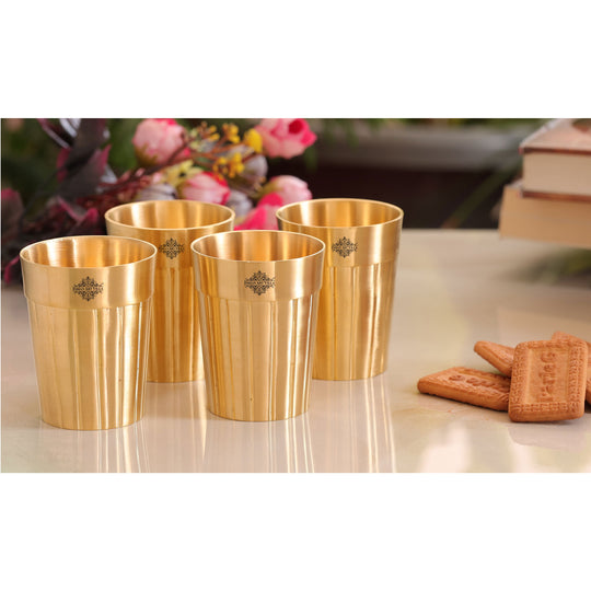 Set of four pure brass glasses with a smooth lined design ideal for enhancing your dining experience with IAV