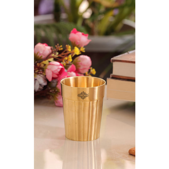 Stylish pure brass glass with a lined finish 160ml perfect for enjoying your favorite beverages in style.
