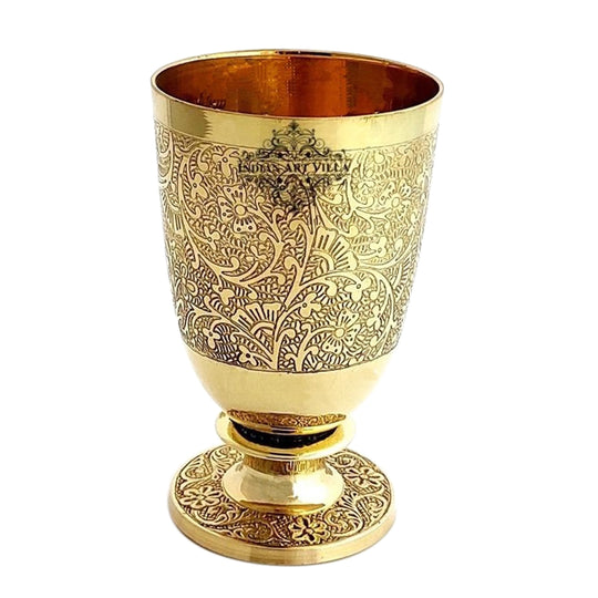 Pure brass glass with flower embossed design aids spiritual growth by providing pure water during pooja and daily meditations