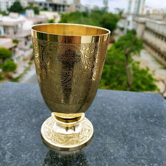 Brass glass with flower embossed design aids in maintaining healthy hydration and is known for its antibacterial properties
