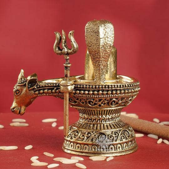 Brass Shivling with Nandi Face & Trishul – Decorative Spiritual Idol