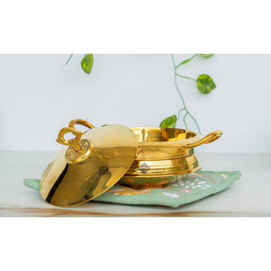 Elegant pital handi with golden finish detailed lid knob and dual handles designed for premium traditional presentation