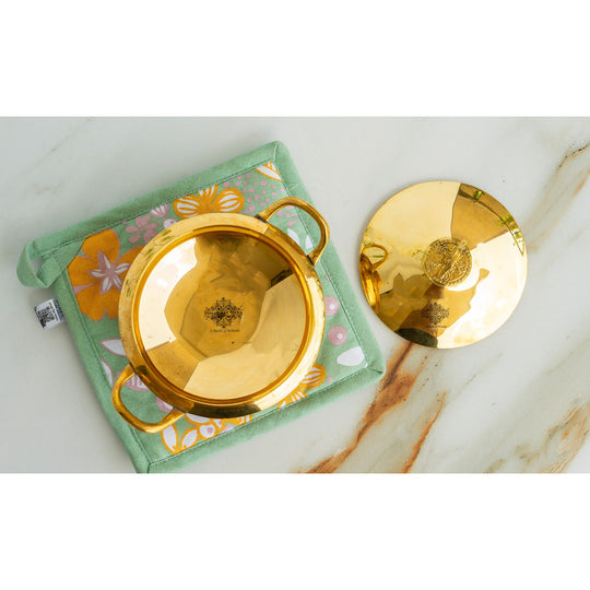 Brass handi with smooth finish round base dual brass handles and a brass lid handcrafted by Indian Art Villa
