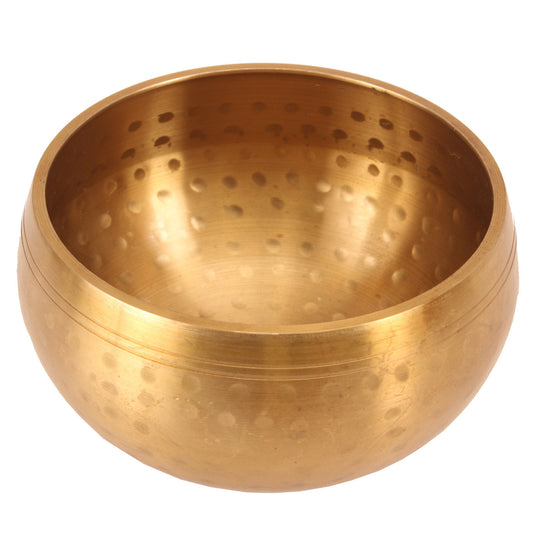 Plain brass singing bowl for meditation, sound healing, yoga, mindfulness, and spiritual therapy practices.