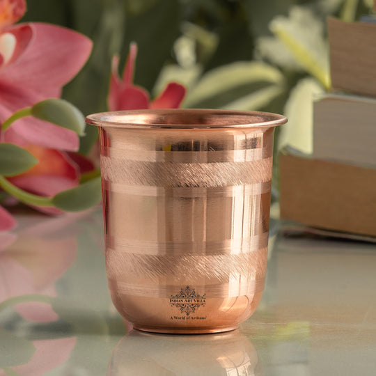 Embossed copper tumbler for wellness drinking