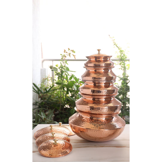 Classic tamba handi with a durable brass lid and elegant hammered copper surface, perfect for creating and serving
