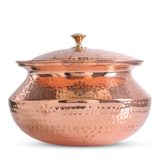 Classic tamba handi with a durable brass lid and elegant hammered copper surface, perfect for creating and serving