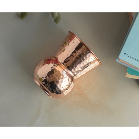 Traditional hammered copper drink vessel