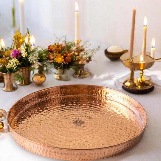 Unique hammered copper thali ideal for serving nutritious food at traditional events and promoting good health.