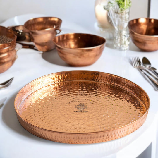 IAV's copper thali with hammered finish ideal for presenting as a luxurious gift during special occasions.