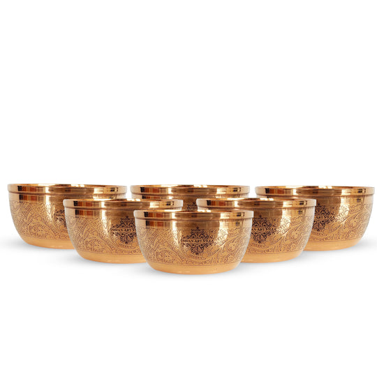Six Indian Art Villa pure copper bowls with intricate floral embossing ideal for serving or home decor purposes