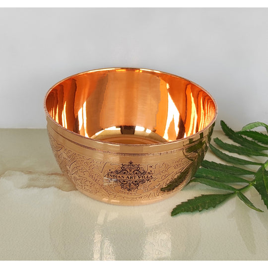 Set of two copper bowls from Indian Art Villa with detailed floral designs perfect for serving or as home decor accents