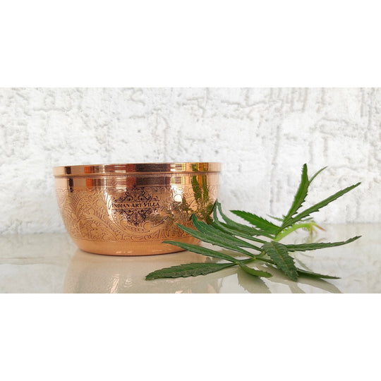 Indian Art Villa copper katori featuring exquisite floral patterns ideal for serving meals or as a decorative accent piece