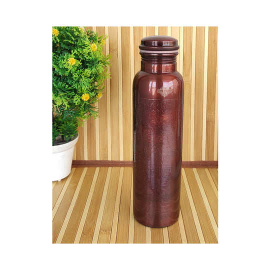 Premium Indian Art Villa dark copper water bottle with embossed details, combining tradition with wellness.